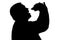 Silhouette of a man with overweight eating hamburger