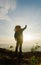 Silhouette of a Man on the Summit: Majestic Dawn on the Mountain