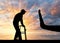 Silhouette of a man with a walker for the disabled and hand gesture stop