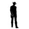 Silhouette of a man in wild west cowboy costume.