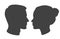 Silhouette of man and woman heads face to face in profile. Portrait of young beautiful girl, boy looking side. Vector