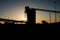 Silhouette of a mining silo and conveyor belts