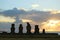 Silhouette of the Moais at Ahu Tahai Ceremonial Platform against Sunset over Pacific Ocean, Easter Island