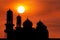 Silhouette mosque or masjid dome on sunset