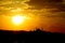 Silhouette of a mosque minaret at sunset