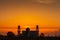 A silhouette of a mosque at sunrise vivid color