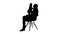 Silhouette Mother and cute baby sitting on a chair.