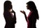 Silhouette mother and daughter dialogue, parent thinks what decision to take