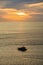Silhouette of a motor speed boat during sunset.