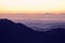 Silhouette of mountains at sunset in the evening at dusk