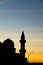 Silhouette of mousque minaret in city downtown