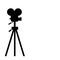 Silhouette movie video camera on the tripod