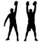 Silhouette muscular man holding kettle bell