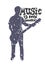 Silhouette of a musician with guitar with space inside and text Music is my Universe