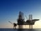 Silhouette offshore oil rig drilling platform