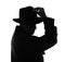 Silhouette of old fashioned detective on white background