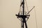 Silhouette of old navy ship`s mast and gaff