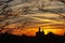 Silhouette of old orthodox church at sunset background. Russia