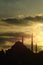 Silhouette of the old town - Sultanahmet mosques in setting sun in Istanbul Turkey.