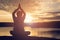 Silhouette of old woman yoga near lake during sunset, Relax time and exercise