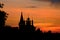 Silhouette of orthodox church on sunset background