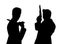 Silhouette of pair of men with pistols