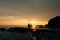 Silhouette of parents with a child at sea. Family on the beach i