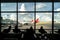 Silhouette of passenger waiting flight for travel in lounge at a