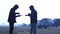 Silhouette of people eating in Desert