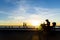 Silhouette of people running, walking, playing at sunset. Praia da Ribeira, Salvador, Bahia, Brazil