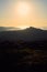 Silhouette of a person contemplating an enormous landscape from Mount GaliÃ±eiro in Vigo, Spain