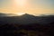 Silhouette of a person contemplating an enormous landscape from Mount GaliÃ±eiro in Vigo, Spain