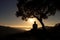 silhouette of a person meditating in nature serenity associated with yoga meditation Generative AI