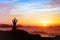 Silhouette of person practicing yoga