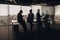 Silhouette photo of businesspeople during working day in modern meeting room