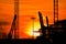 Silhouette photo during sunset, container lifting crane in Laem Chabang deep sea port