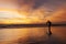 Silhouette of photographer on the beach