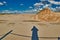 Silhouette of a Photographer taking picture of Leba Dunes