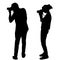 Silhouette of photographers on white background