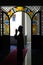 Silhouette of pilgrim ,praying in  mosque