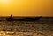 Silhouette of pirate boat in the sea in Somalia during sunset