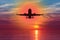 Silhouette of plane in the sky above Sea at Sunset. travel, flight, vacation Concept. Low key photo. relax time