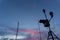 Silhouette of Portable Automatic Weather Station at Ngurah Rai airport under morning sky. This tool has a function to measuring