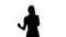 Silhouette Portrait of happy young Woman Talking