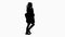 Silhouette Pregnant woman with backpack walking and talking on the phone.