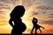 Silhouette a pregnant woman and loving couple