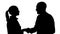 Silhouette Profile view of happy mature male and female doctors smiling while shaking hands.