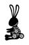 Silhouette rabbit seated with mid autumn decoration in skin