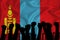 Silhouette of raised arms and clenched fists on the background of the flag of mongolia. The concept of power,  conflict. With