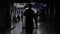 Silhouette of referee walking through tunnel control hockey